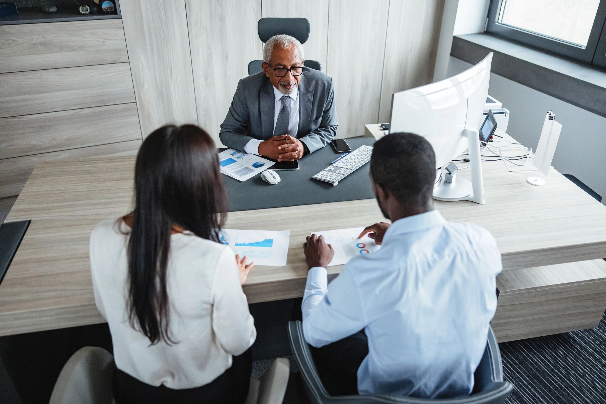 Professional collaboration representing market insights and strategy